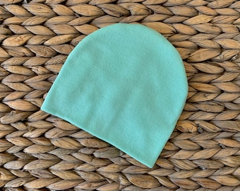 Newborn slouch beanie in mint green sweater knit
