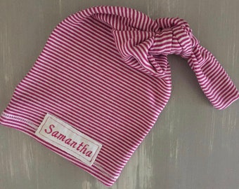 Newborn knot beanie in pink striped jersey knit