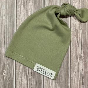 Newborn knot beanie in olive green jersey knit