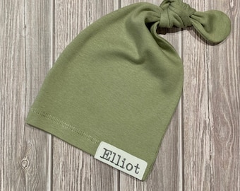 Newborn knot beanie in olive green jersey knit