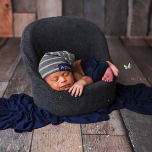 Newborn slouch beanie in gray striped sweater knit