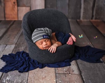 Newborn slouch beanie in gray striped sweater knit