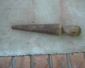 Estate vintage wood pestle or masher. Solid wood primitive style kitchen utensil used for grinding herbs, mashing to make a paste,