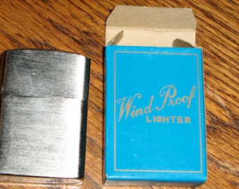 vintage golden bell Japan lighter new old stock with box
