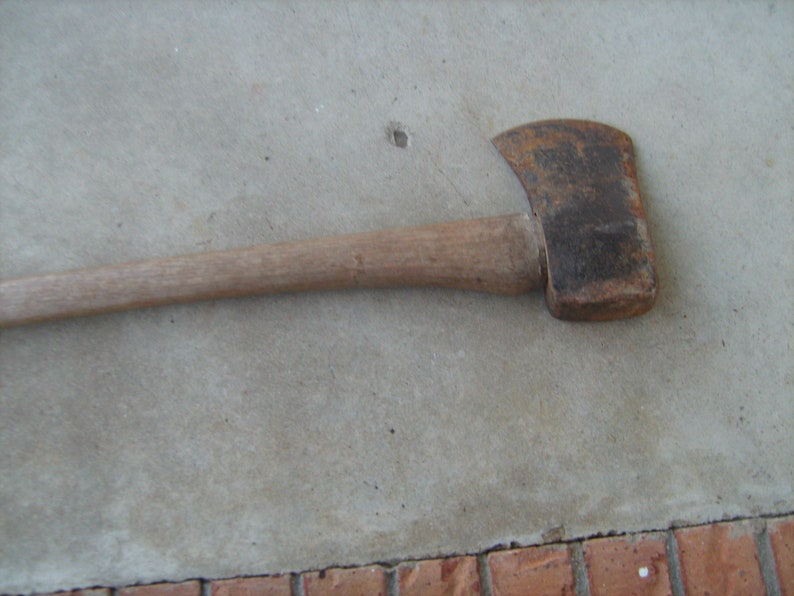 vintage old single bit long handle axe
