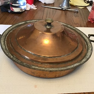 Vintage lidded copper pan with brass side  handles