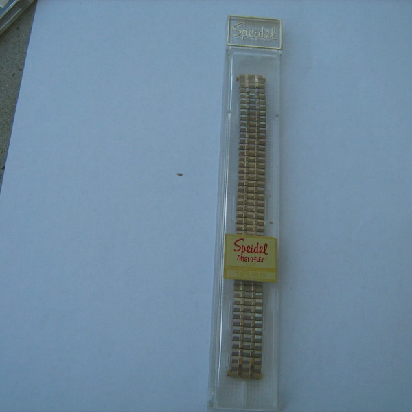 1960s  new old stock speidel man's watch band stock  no. 2213 yellow 1/2"  twist-0- flex