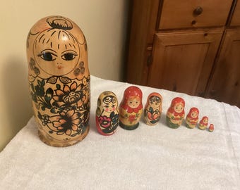 Vintage assorted Russian hand painted nesting dolls set of 7