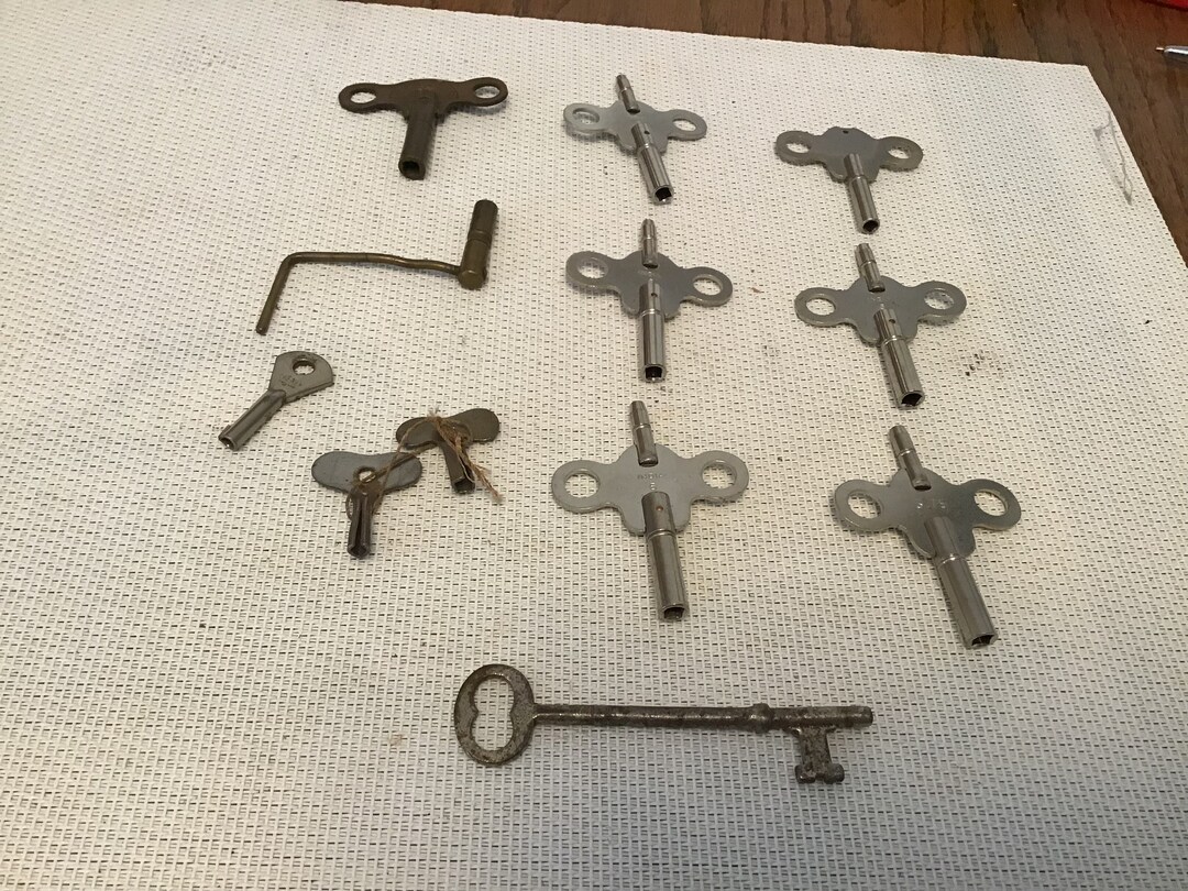 12 Vintage Clock Keys Some Doubles Some Old and Some Newer One Skeleton