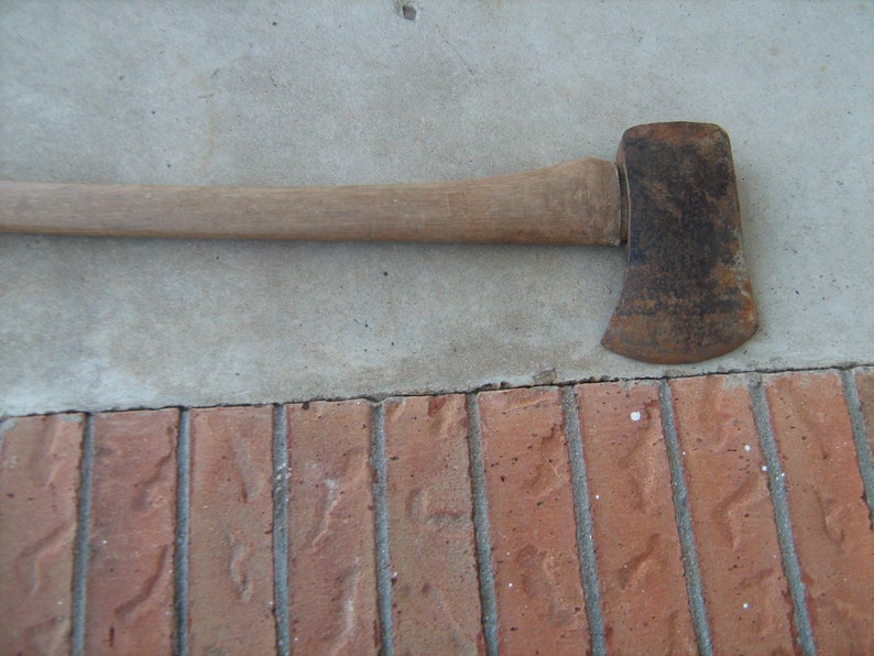 vintage old single bit long handle axe