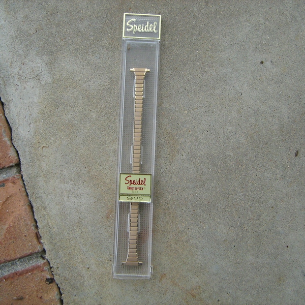 1960s  new old stock speidel gold finish ladies  twist - o- flex watch band retail for 9.95 back in the day