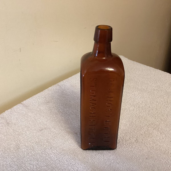 Early 1900s Dr. J. Hostetter’s amber stomach Bitters bottle B-1