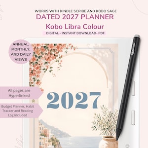 Pode incluir: Uma agenda digital 2027 para Kindle Scribe, Kobo Sage e Kobo Libra Colour. O ecrã mostra uma ilustração costeira com o ano 2027 em texto azul. Uma caneta preta repousa sobre o dispositivo. O texto inclui Annual, Monthly, and Daily Views.