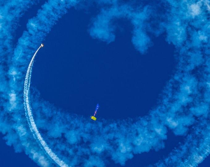Skydiver Plane Smoke Trails, Australian Flag Parachute, Bright Blue Sky Photo