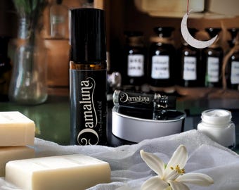 Aceite de perfume Damaluna: Almizcle calmante, lino suave, flor de naranja