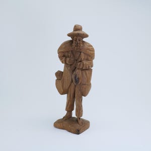 Vintage Hand-Carved Wooden Figurine of a Traveling Old Man with Hat and Bag, Rustic Folk Art Sculpture, Collectible Wood Carving
