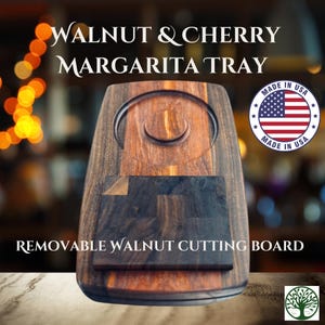 May include: Walnut and cherry wood margarita tray with a removable walnut cutting board. The tray features a circular indentation for a glass and is made in the USA.