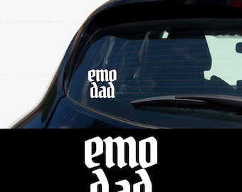 May include: White vinyl car sticker with the text "emo dad" in a gothic font.