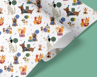 May include: White wrapping paper with a repeating pattern of dogs wearing party hats and holding balloons. The dogs are in various breeds and colours, including dalmatian, dachshund, and corgi. There are also small gift boxes and confetti scattered throughout the pattern.