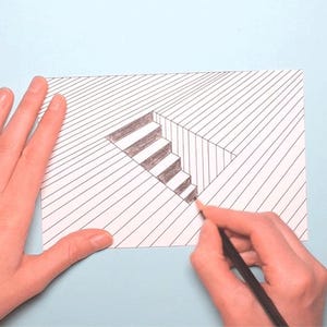 May include: A hand-drawn optical illusion of a staircase on white paper. The artwork features parallel lines creating a 3D effect, with the stairs shaded in gray. A pencil is used to draw the illusion on a light blue background.