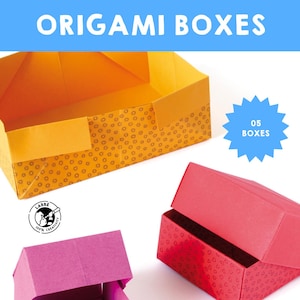 May include: Three origami boxes, one yellow with a pattern of small circles, one pink, and one red. The boxes are all folded and have lids. The text "05 BOXES" is on a blue starburst.