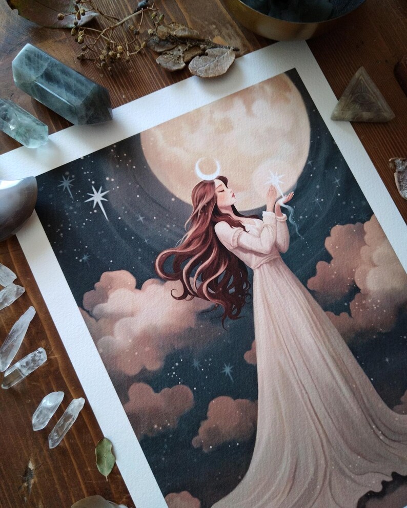 May include: A watercolor painting of a woman with long red hair standing in front of a large, full moon. She is wearing a white dress and holding a small, glowing star in her hand. The background is a dark blue sky with clouds and stars.