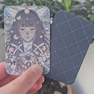 Front and Back facing Genshin Impact Columbina Photocard