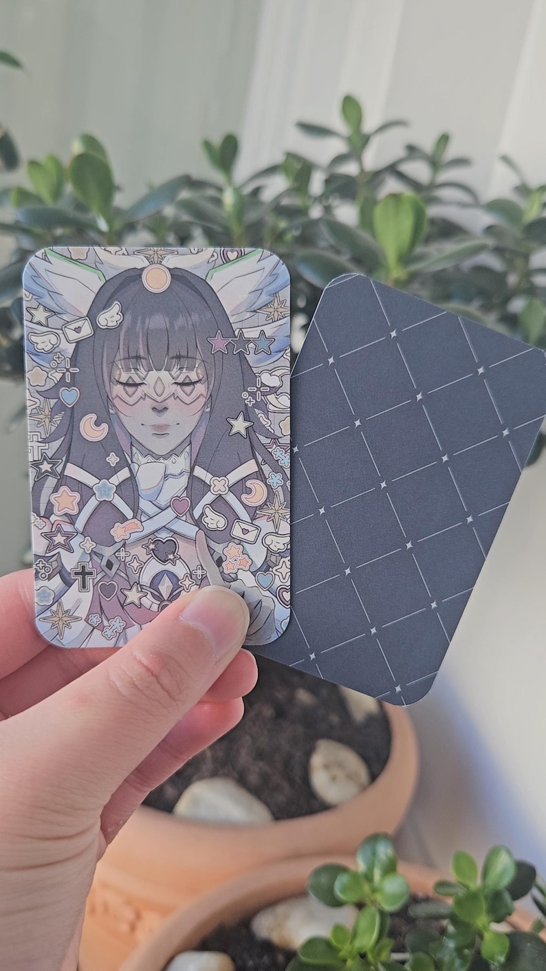 Front and Back facing Genshin Impact Columbina Photocard