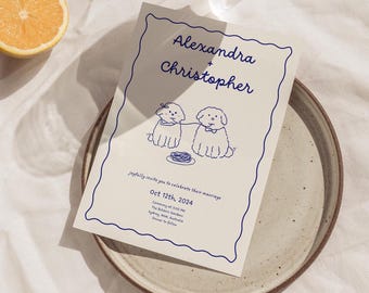 May include: A wedding invitation with a blue and white design featuring two cartoon dogs eating spaghetti. The invitation reads "Alexandra + Christopher joyfully invite you to celebrate their marriage Oct 12th, 2024 Ceremony at 5:00 PM The Botanic Gardens Sydney, NSW, Australia Dinner to Follow"