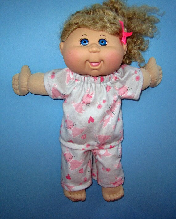 cabbage patch kids toddler girl with blonde hair and blue pajamas