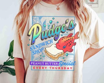 Camiseta vintage de Disney Pudge's Sandwich Shop, camiseta de Lilo y Stitch Pudge el pez, Disney Pudge controla el clima, viaje familiar a Disneyland 2025