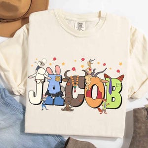 Custom Name Disney Zootopia Movie Characters T-shirt, Judy Hopps & Nick Wilde Shirt, Zootropolis Disney Tee, Disneyland Family 2025 Trip Tee