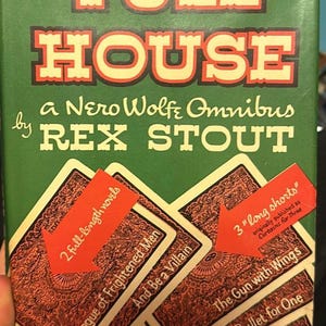 May include: A green book cover with the title "FULL HOUSE" in red and yellow lettering. The book is a Nero Wolfe Omnibus by Rex Stout. The cover features playing cards with the titles of the stories: "The League of Frightened Men", "And Be a Villain", "The Gun with Wings", "Bullet for One", and "Disguise for Murder".