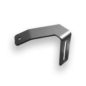 May include: A metallic gray, L-shaped bracket with a small circular hole on one end and a vertical slot on the other. The bracket is made of a solid, possibly steel, material and is designed for mounting or support.