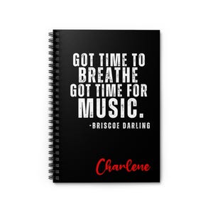 May include: Black spiral-bound notebook featuring the quote "GOT TIME TO BREATHE GOT TIME FOR MUSIC." in white, attributed to Briscoe Darling. The name "Charlene" is written in red script at the bottom of the cover.