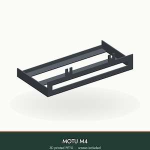 May include: A black 3D printed PETG mounting bracket for a MOTU M4 audio interface. The rectangular frame features two vertical U-shaped clips on the inner crossbar and includes screws for installation, designed for secure equipment mounting.