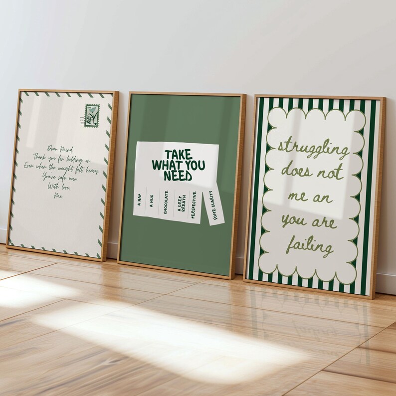 May include: Three framed art prints with inspirational quotes. The prints have wooden frames and feature text in various fonts and colors. One print says "Dear Friend" and another says "Take What You Need."