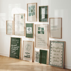 May include: A collection of framed art prints with inspirational quotes and abstract designs. The color palette includes shades of green, beige, and white. The frames are made of light-colored wood. The prints feature phrases like "Better Days Are Coming" and "It Is Ok To".
