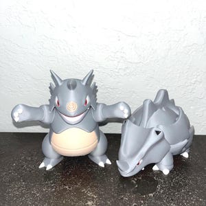 Pokemon #111 Rhyhorn, #112 Rhydon and #464 Rhyperior Figures Pokemon #111 Rhyhorn, #112 Rhydon and #464 Rhyperior Figures