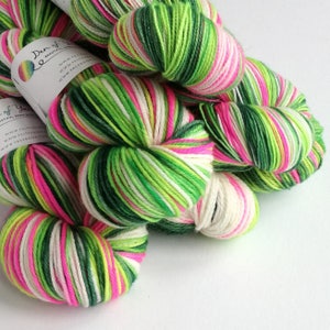 Hand dyed yarn pre-order.  Whoville colourway, variegated wool yarn. Dyed to order. Christmas yarn, you choose base.  Pink and greens
