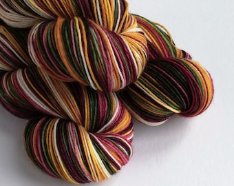 Hand dyed Christmas yarn pre-order.  Vintage Christmas colourway, variegated wool yarn, dyed to order you choose base, dark red, green, gold