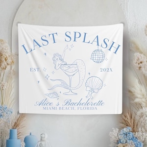 May include: White tapestry with blue text that reads "Last Splash" with a mermaid in a martini glass, a disco ball, and seashells. The text also reads "Est. 202X Alice's Bachelorette Miami Beach, Florida."