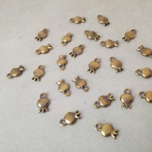 Tiny pomegranate charms, brass copper plated charms for jewelry and crafts, set of twenty, oxidised pomegranate charms, pomegranate supplies