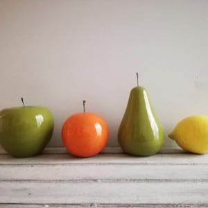 Ceramic fruit sculptures, life size ceramic fruit of earthenware clay , orange, lemon, pear and apple, set of four ceramic life size fruit