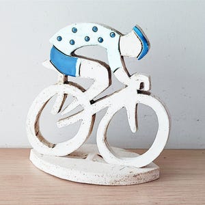 Blue cyclist figurine, modern cyclist sculpture, earthenware clay cyclist figure with blue white clothes, racing cyclist figure