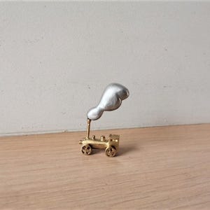 Brass train sculpture, tiny train locomotive figurine with silver smoke, tiny brass train locomotive figurine, train art object