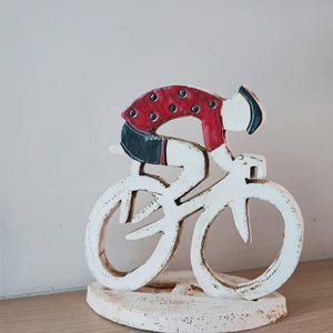 Cyclist figurine, modern cyclist sculpture, earthenware clay cyclist figure with red black clothes, racing cyclist art object