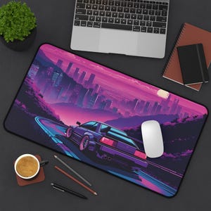 May include: A purple car drives on a winding road through a city skyline at night. The city is lit up with neon lights and the sky is a vibrant pink and purple. The car has a white mouse next to it.