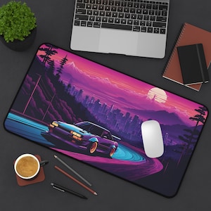May include: A purple and pink retro-style illustration of a city skyline with a car driving on a winding road. The car is a purple and blue sports car with a white moon in the background.