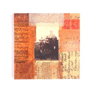 May include: A square mixed-media collage featuring a central black and white photograph of a group of people. The background consists of layered vintage paper, including printed text, handwritten script, and a piece of textured beige fabric.